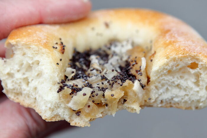 Onion bialy (biteaway view), Kossar's, West 72nd St., Manhattan