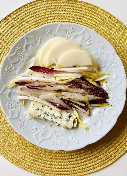 Risotto alla milanese all’onda. Butter shallots ,saffron, nano vialone rice,white wine,chix broth, Parmesan.                            Endive salad, pears, St.Agur.