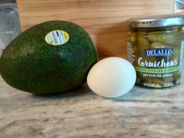 Jul 5 new grocery items HUGE Jumbo Reed avocado Cornichons tiny gherkin pickles Egg for size