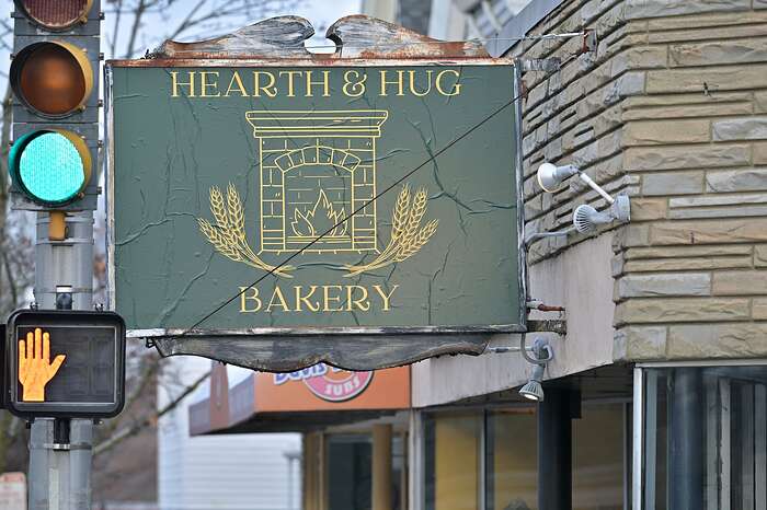 Signage outside the Hearth & Hug Bakery in Somerville on Dec. 10.